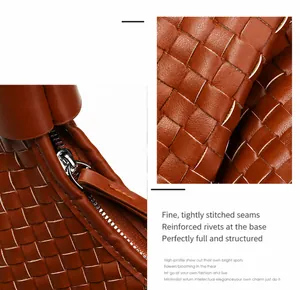 Close-up of caramel woven tote showing the metal zipper closure and intricate leather texture
