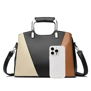 Three-tone color block tote bag in lychee texture leather with a removable shoulder strap