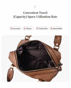 Detailed interior of brown lychee leather bag showing large capacity for essentials