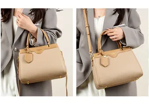 Detail of beige lychee leather tote bag with sturdy metal feet and adjustable strap