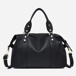 Classic black lychee pattern Boston handbag with gold hardware and adjustable strap