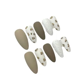 Almond press-on nails with leopard print and 3D sweater texture in earthy brown tones