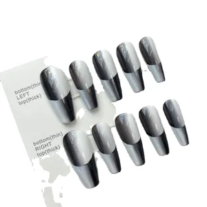 Handmade press-on nails featuring black and white gradient cat-eye French geometric designs