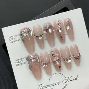 Handmade ballerina press-on nails with pink heart crystals and gradient glitter