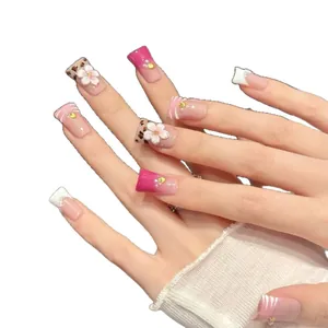 Floral leopard print press-on nails with 3D cherry blossoms and pearl accents