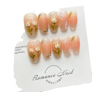 Handmade pink gradient press-on nails with 3D white tulips and pearls for summer