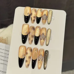 Unghie Finte Francesi Nere Oro Occhio di Gatto Con Fiori 3D Strass Lussuose Unghie Lunghe Fatte a Mano per Donna Festa
