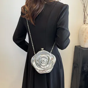 Sleek silver mirror acrylic rose shaped clutch bag with crossbody chain for women