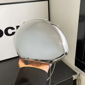 Silver mirror acrylic egg-shaped handbag with sleek metal chain and chrome finish