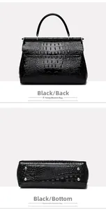 Detail view of the black crocodile pattern handbag showing the back and protective silver feet