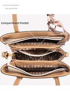 Top view detail of leather tote interior showing multi-compartment lining with silk scarf