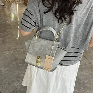 Grey frosted leather tote with crocodile pattern and golden hardware chain strap