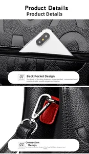 Detail of black pebbled leather bag featuring a back zipper pocket and silver metal hooks