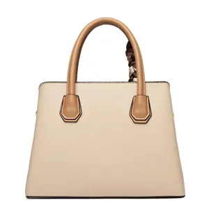 Minimalist beige lychee grain leather tote bag with khaki handles and decorative scarf