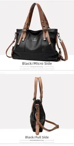Detail of black lychee grain leather tote bag with brown handles and silver ZMBIRD logo