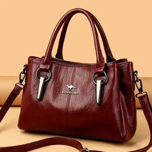 Sac à main élégant en cuir rouge vin pour femme avec logo kangourou métallique
