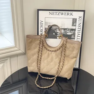 Quilted khaki suede tote bag with elegant gold chain shoulder strap and large capacity