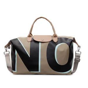Large capacity canvas travel bag in khaki with NO letter print and leather handles