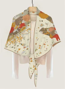 Detail of floral and horse print triangle scarf tied over a white blouse