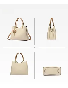 Multi-angle views of khaki crossbody handbag with heart charm and round handles