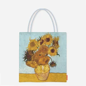 Detail of Van Gogh Sunflower print tote bag with textured canvas and gray handles