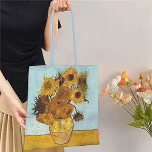 Detailed close-up of Van Gogh sunflower print tote bag with blue rope handles and large capacity