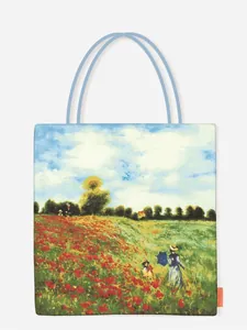 Canvas tote bag with impressionist Monet Poppy Field print and light blue handles