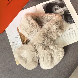 Thick plush faux fur scarf for women in warm beige mix with a cross-over buckle design