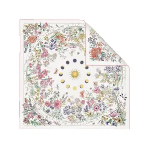 Elegant ivory faux cashmere scarf featuring zodiac symbols and watercolor floral print
