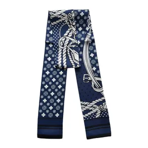 Navy blue Twilly silk scarf with nautical rope and monogram print on white background