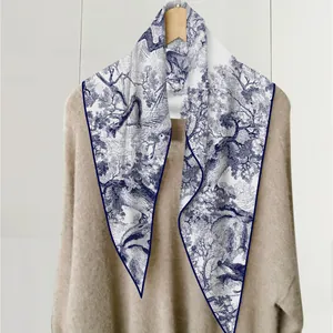 French style Toile de Jouy scarf with blue floral and jungle animal prints on white fabric