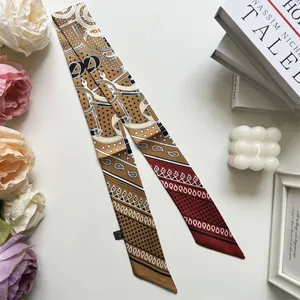 Close-up of elegant polyester twilly scarf with vintage equestrian horse bit prints