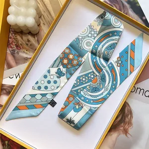 Elegante pañuelo largo twilly de seda con estampados de insectos en caja de regalo amarilla