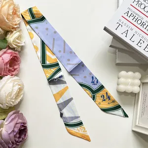 Detail of multi-colored geometric silk twilly scarf for DIY handbag decoration
