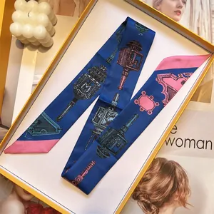 Smalle Twilly zijden sjaal in blauw en roze met vintage lampenprint voor tassen
