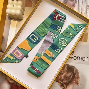 French vintage style green silk twilly scarf with equestrian print in a gift box