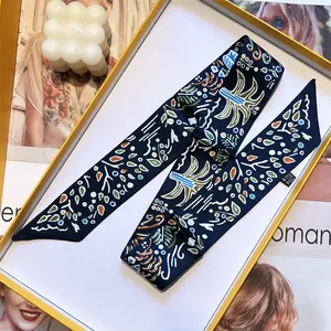 Deep blue skinny silk scarf with botanical prints in a premium gift box set