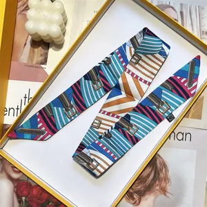 Fashionable silk twilly scarf with colorful geometric patterns and buckle print in a gift box