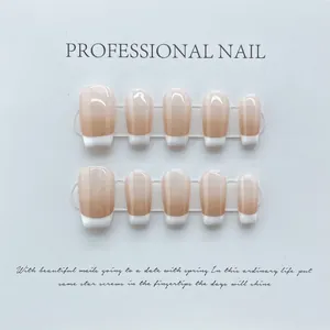 Handmade ballet style French gradient press-on nails with polished glossy finish