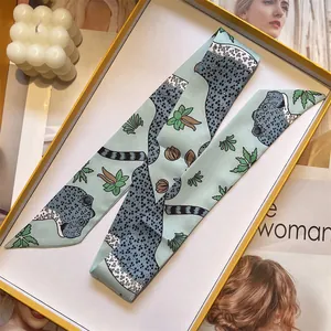Light green Twilly silk scarf with leopard print in a premium yellow gift box