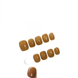 Handmade translucent caramel cat-eye short press-on nails with glossy jelly finish