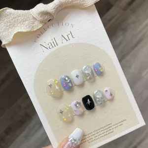 Sweet and cool Y2K star press-on nails in cream blue and yellow on display cards