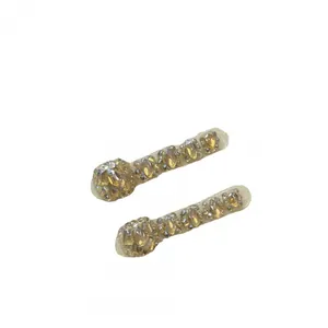 Champagne glitter press-on toenails with luxury rhinestones and amber crystal embellishments