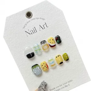 Handmade short press-on nails with colorful artistic graffiti and grid patterns