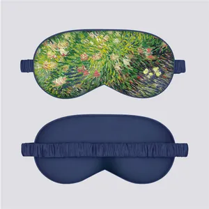 Detail of silk eye mask featuring Impressionist water lily print and elastic strap