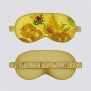 Detail showing front floral print and smooth satin reverse of Van Gogh sunflower eye mask
