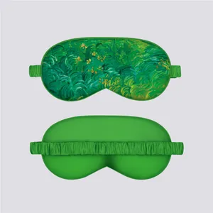 Detail of Monet water lily silk eye mask showing artistic print and elastic strap