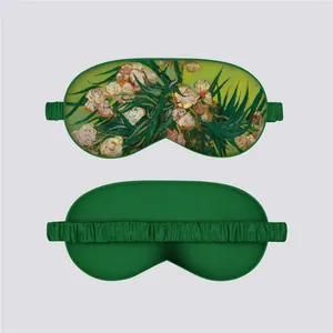 Detail view of Van Gogh Oleanders print eye mask with smooth green silk reverse side