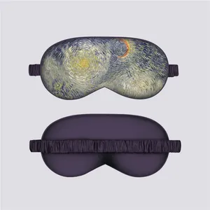 Detail of silk sleep mask featuring Van Gogh Starry Night art and purple satin back