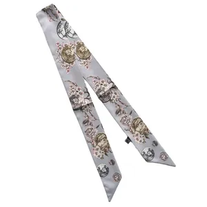 Elegant skinny silk scarf with pink cherry blossoms and medallion print on light blue